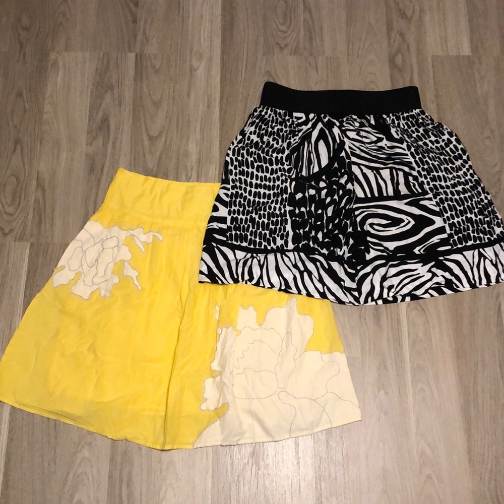 *TWO* skirts. Yellow size 4, black side Small.
